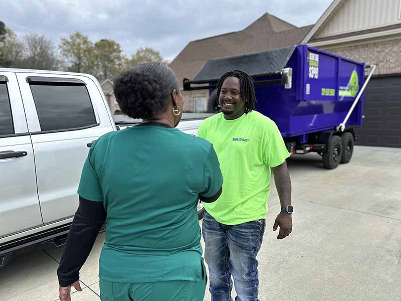 Bama Dumpster Rentals and Junk Removal Expert With Client